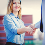 teenage girl shaking hands at a job interview